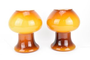 A pair of 1970s Italian Prova glass mushroom lamps, in graduated amber colour, one with Prova