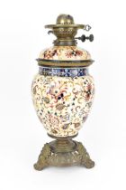 A Hungarian porcelain oil lamp by Ignác Fischer, late 19th/early 20th century, Budapest, with lobbed