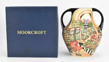 A Moorcroft pottery vase designed by Kerry Goodwin, shape 5/13, limited edition 3/4, with twin-
