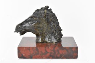 A late 19th century French patinated bronze model of a horse head, mounted on a griotte marble