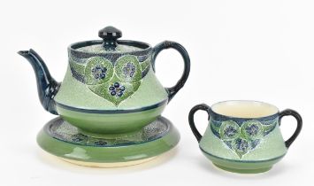 A William Moorcroft (1872-1945) for James Macintyre & Co Florian tea set, circa 1900, comprising a