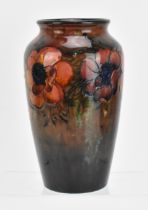 A William Moorcroft (1872-1945) 'anemone' pattern flambe vase, circa 1935, of tapering shouldered