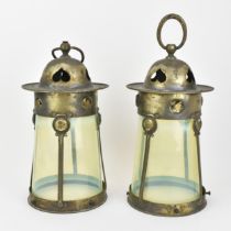 A pair of Arts & Crafts brass mounted vaseline glass lantern shades, circa 1900-1910, the tapered