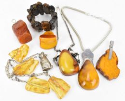 A small collection of amber mounted jewellery,