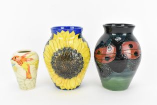 A small collection of Dennis China Works vases designed by Sally Tuffin, to include a miniature vase