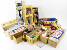 A collection of boxed Pelham puppets, to include