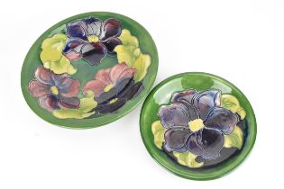 A collection of Moorcroft pottery, to include a large bowl by Walter Moorcroft in the 'Clematis'