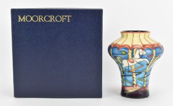 A Moorcroft pottery 'Merry-go-Round' vase designed by Emma Bossons, 2002, limited edition 158/350,