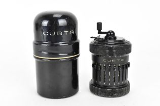 A Curta Calculator by Contina Ltd Mauren, Liechtenstein, serial number 504537, in black, in original
