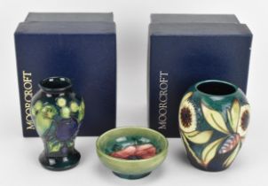 A small collection of Moorcroft pottery, to include an 'Albany' pattern miniature vase designed by