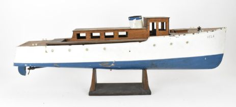 A scratch-built painted wooden steam boat model on stand, the white painted hull named 'Vela', on