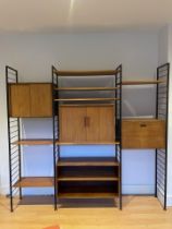 A Mid Century teak Ladderax three bay unit designed by Robert Heals for Staples, with converted TV