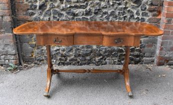 An Edwardian style string inlaid mahogany sofa table, in the Regency style, with matchbook flame