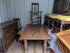 Early to mid century carved oak refectory style dinning table 73x182x82.5cms, a similar oak