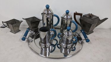 An Art Deco style inox coffee set together with a pewter three piece tea set Location: