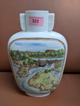 Oskar Dahl for Rorstrand, a Swedish pottery vase decorated with a river landscape to one side, and a