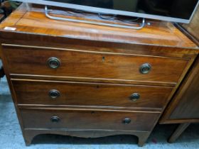 A George III straight front chest of three long drawers with shaped apron on splayed legs A/F 83cm x