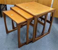 A nest of three retro teak occasional tables, largest 49cm h x 53.5cm w Location: