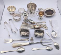 Silver to include two salts, a pepper, three teaspoons, and a napkin ring 159g, and silver plated