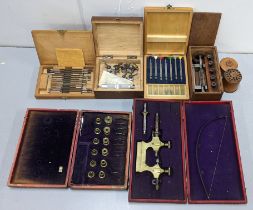 A selection of watchmakers tools to include Savoy screwdriver set, 'tour a pivoter' tool and other