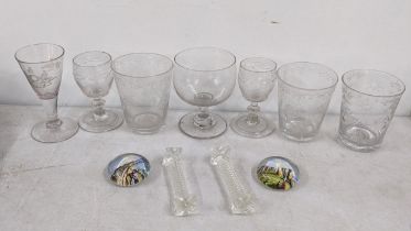 A selection of Georgian and later glasses together with a pair of cutlery rests and two paperweights