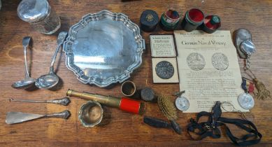 A mixed lot to include silver plated food tray ladles and others along with a boxed Lusitania Medal,