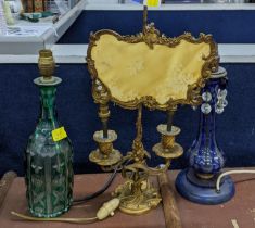 A French 19th century Ormalu bouillotte lamp, a Bohemian glass decanter converted to lamps and a