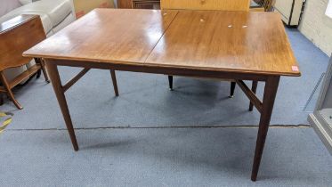 An Everest teak extending dining table on four turned tapering legs, 42cm Location: