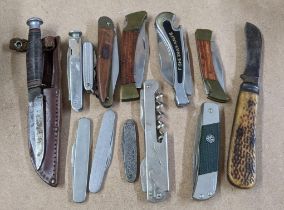 An early 20th century William Rodgers fighting knife together with mixed pen knives including a