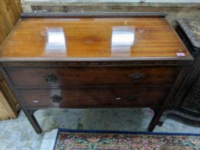 Early 20th century mahogany two drawer side table, blind carved decoration to the legs and drawer