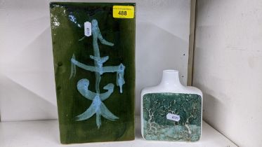 A Clee pottery green glazed vase in rectangular form having an Oriental inspired design together