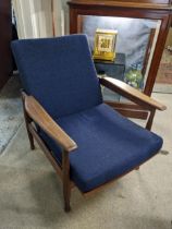 Guy Rogers teak framed mid 20th century reclining armchair in a blue tweed fabric Location: