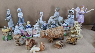 A mixed lot of models and figurines to include two CWS Scottish studio pottery models of Highland