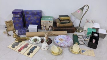 A mixed lot to include two boxed fashion watches, boxed Seiko travel alarm clock, blueprints of