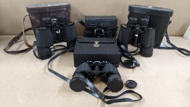 Four pair of cased binoculars to include Mark Scheffel Location