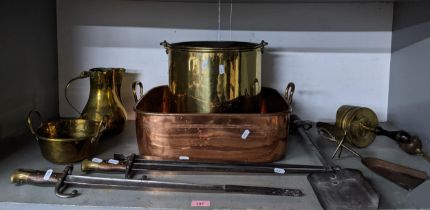 A selection of brass and copper fireside items to include a three piece fire compendium set