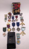 A collection of silver gilt and enamel Masonic medals to include 1914-1918 examples, Steward and