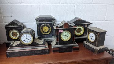 A group of six late 19th century black slate and marble mantle clocks Location: