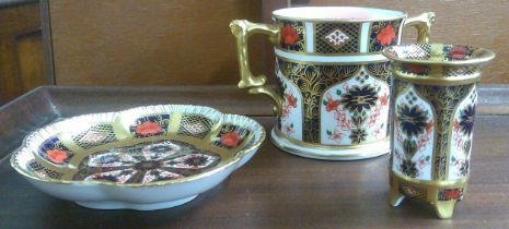 Three Royal Crown Derby pieces comprising of a twin handled mug, a pin dish and vase Location: RAB