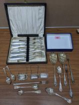 A selection of silver and silver plated items to include a Port and Sherry wine table set,