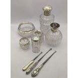 Silver topped and handled dressing table items to include two scent bottles, A/F, salt jar, button