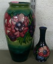 A Moorcroft vase A/F and a smaller vase each decorated with poppies Location: BWR