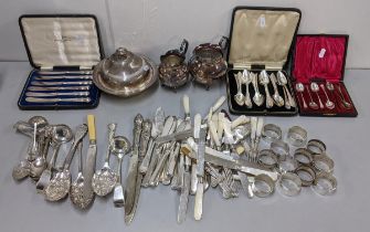 Mixed silver plate to include napkin rings cased cutlery, muffin dish and other items Location: