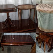 A mahogany coffee table on ball and claw feet together with two Lloyd Loom basket, nest of tables