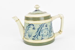 A James Macintyre 'Gesso Faience' florian teapot, designed by Harry Barnard, circa 1894-97, of