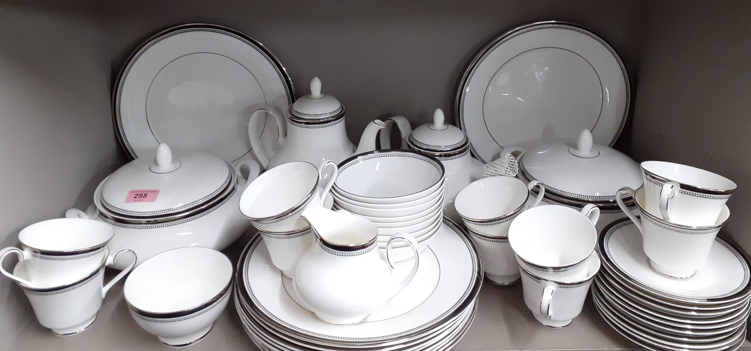 A Royal Doulton 'Sarabande' part dinner and tea service having a white ground with silver coloured