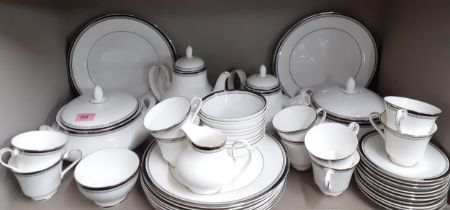 A Royal Doulton 'Sarabande' part dinner and tea service having a white ground with silver coloured