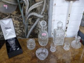 A selection of cut table glass to include a boxed Waterford crystal flower vase, whiskey and one