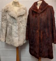A vintage arctic rabbit fur jacket with internal leather trim to the fastening, 38" chest x 29" long