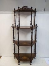 A Victorian inlaid walnut four tier what-not with spiral turned columns Location: